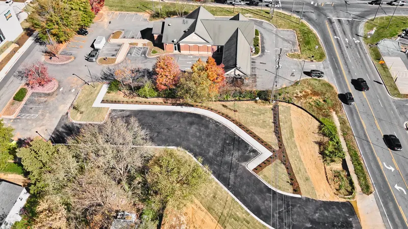 Aerial view of a commercial site with new curb and drive
