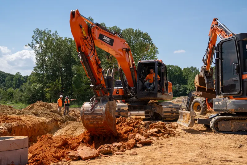 Two Largent excavators digging for a storm structure