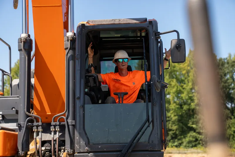 Operator in the cab of a Largent excavator